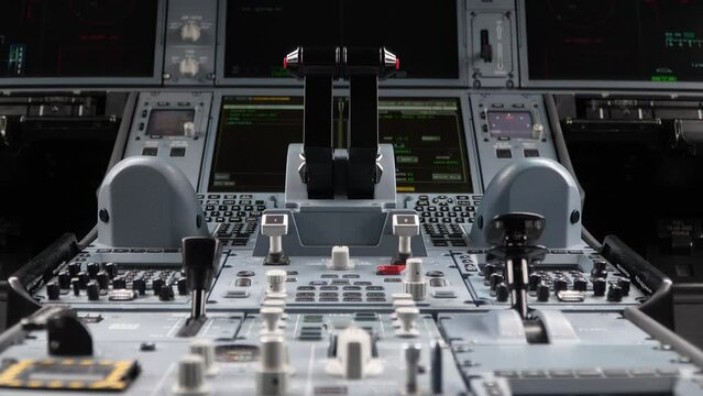 Tableau de bord central du cockpit d'un avion, central dashboard of an airplane cockpit