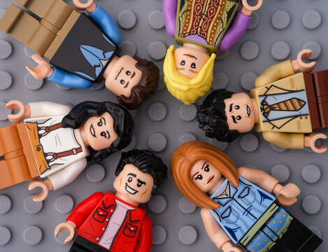 Tambov, Russian Federation - October 01, 2023 Lego Ideas Friends characters minifigures - Ross Geller, Rachel Green, Chandler Bing, Monica Geller, Joey Tribbiani, Phoebe Buffay, on a gray baseplate