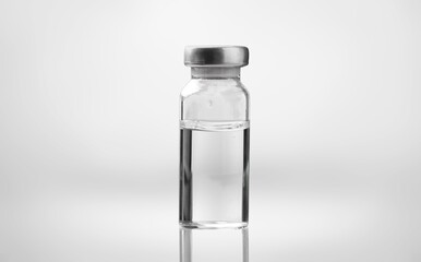 A single vial of injection on clinic desk