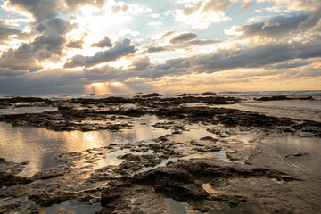 Reflecting clouds on little puddles 4