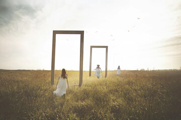 woman imagines herself in loop running through surreal doors in a field, abstract concept