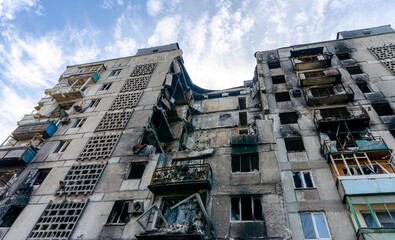 destroyed and burned houses in the city during the war in Ukraine