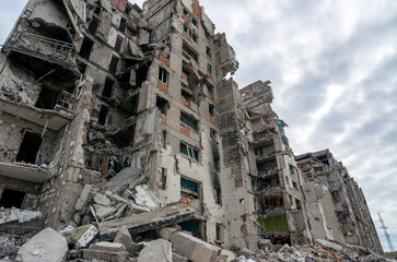 destroyed and burned houses in the city during the war in Ukraine