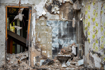 destroyed and burned houses in the city during the war in Ukraine