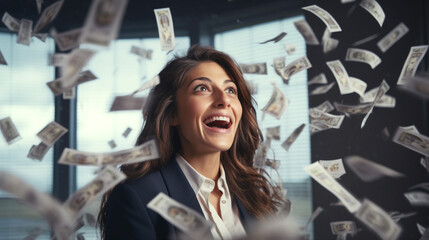 Surreal portrait of attractive young businesswoman looking excitedly over at wads of flying cash in office. Banner.