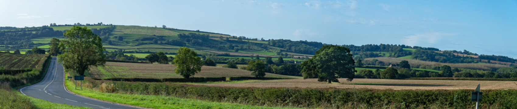 Panoramic view across English farmland on sunny autumn day