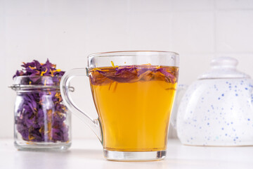 Blue lotos, Nymphaea caerulea hot tea. trendy natural beverage. Anti-stress, soothing and relaxing organic drink, healthy sleep drink