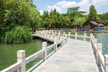 Fototapeta na wymiar Summer Scenery Stone Bridge in Pearl Spring Scenic Area, Nanjing, Jiangsu Province, China