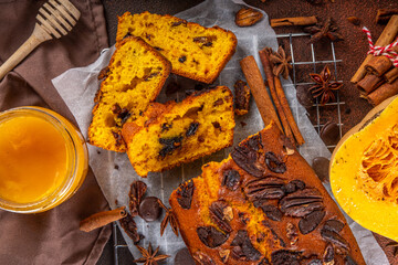 Homemade pecan and chocolate pumpkin  bread. Sliced loaded sweet dessert pumpkin bread, with nuts...