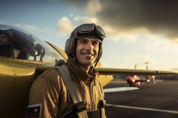 A man wearing a pilot's uniform stands in front of an airplane. Suitable for aviation-related projects and publications.