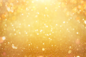 Defocused shining yellow bokeh background. Christmas texture.