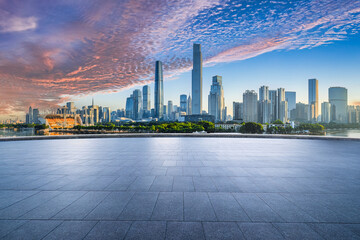 Guangzhou city square floor and building skyline in the early morning - obrazy, fototapety, plakaty