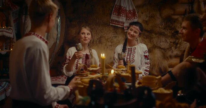 historical reenactment of matchmaking ritual in ancient Slavic culture, peasants at table, 4K Prores