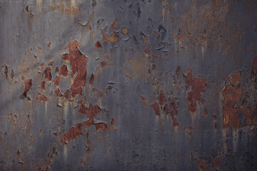 Old cracked painted wall with rust texture. Grunge rusted metal background. Rust stains.