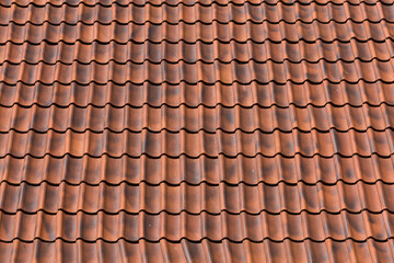 Red tiles roof background
