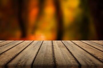 The empty blank wooden table with background of autumn.