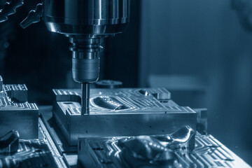 The CNC milling machine rough cutting the injection mold parts by indexable tools.