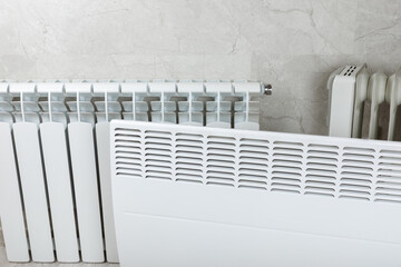 Different types of radiators. Heating systems store.Modern radiator at home. Central heating...