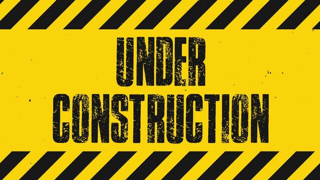grunge yellow background with under construction sign. 4K motion animation.