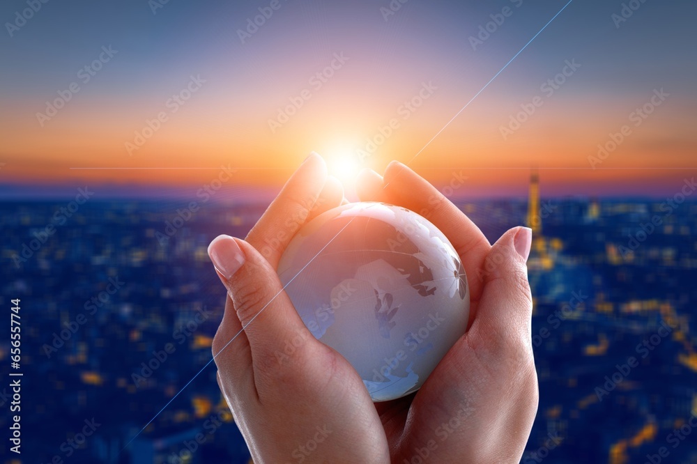 Wall mural Planet Earth globe in the human hands