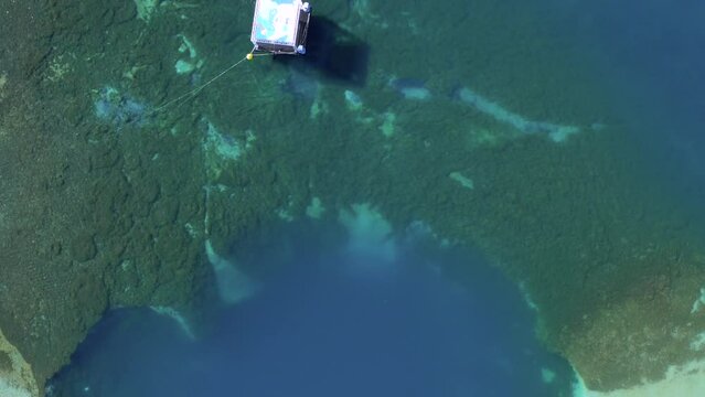 Tignes - Flying with a drone above the lake of Tignes and discovering the grass underwater