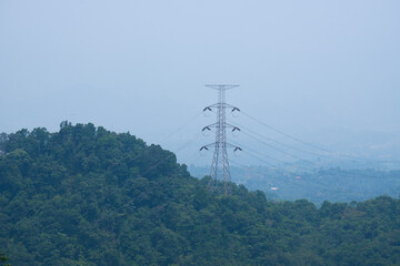 Extra high voltage overhead line in green hills