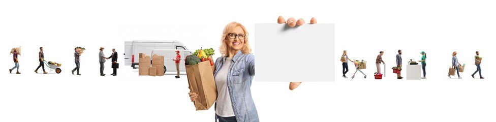 Woman with a grocery bag holding a blank card and posing in front of farmers delivering goods to...