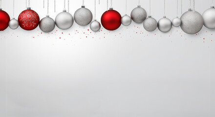 Red, silver, and white Christmas ornaments on a white background, space for copy or text