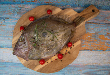 Saint-Pierre Seafish, Zeus Faber, John Dory, Pez de San Pedro, fish, isolated on cutting board...