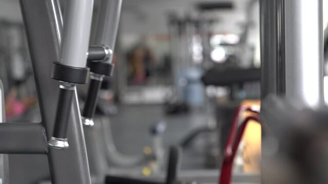 Barbell in gym, shot of exercise equipment in a gym,