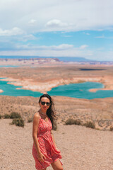 Young woman enjoying the view Lake Powell, Glen Canyon National Recreation Area