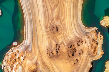 Texture of a wooden table with epoxy resin. Karagach, wood texture