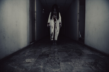 Portrait of asian woman make up ghost,Scary horror scene for background,Halloween festival...