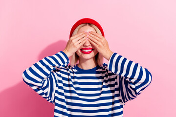Photo of young funny girl blonde hair blind close hands her eyes satisfied smile playing joke...