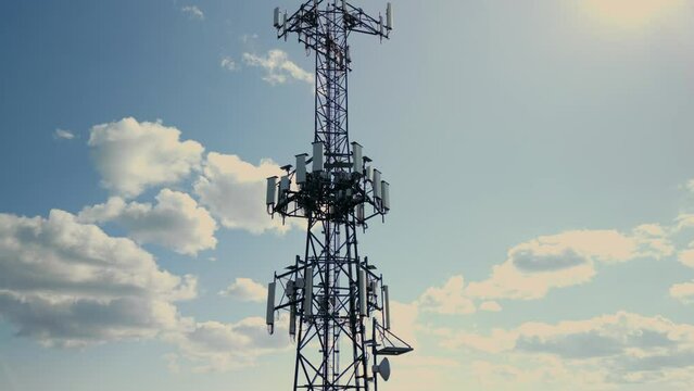 Aerial view on Mobile Tower installation. Cell site and Telecom Base Station. 