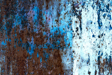 Cracked paint on metal surface. Metal texture with rust