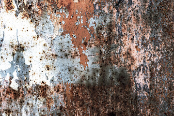 Cracked paint on metal surface. Metal texture with rust