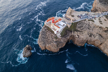 Saint Vincent Cape and Lighthouse, Portugal. Aerial drone view at sunset