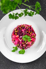 beet salad vegetable green peas, carrot, potatoe, onion, pickled cucumber meal food snack on the table copy space food background rustic top view