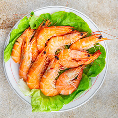 Gambas prawn fresh shrimp seafood crustacean langoustine meal food snack on the table copy space food background rustic top view