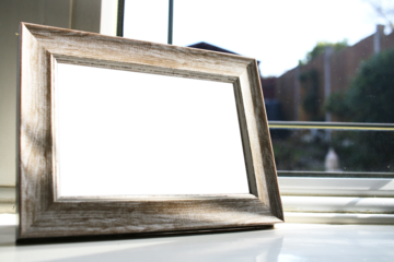 blank photo frame png mockup, on window ledge background, transparent centre