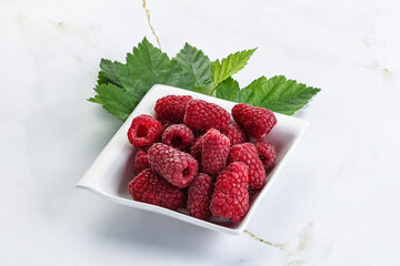 Rope sweet juicy raspberry heap