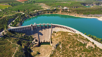Aerial view of the dry spillway of a concrete dam during a long drought. Forata reservoir,...