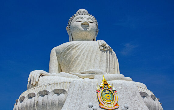 Impressive Big Buddha landmark on Phuket Thailand. Cloudless blue sky. Space for text.