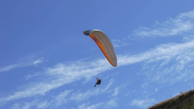 Paragliding on the background of blue sky. Live a healthy life. Be H3althy