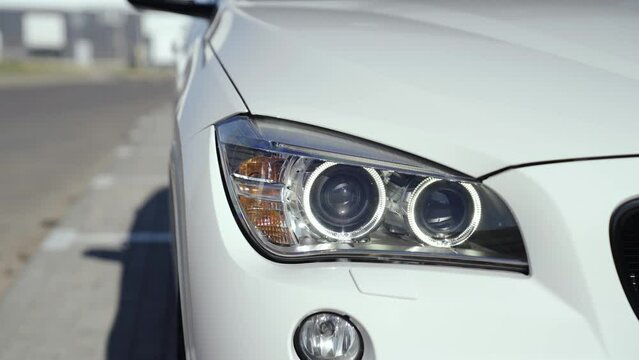  Close-up of headlights. Angel eyes