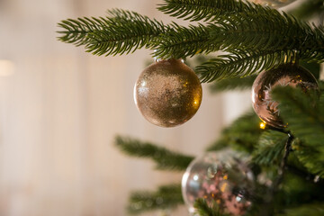 christmas tree decoration. toys and garlands. festive decor during winter holidays.Glittery...