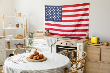 Interior of stylish kitchen with hanging USA flag