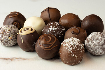 group of chocolate truffles of various flavors