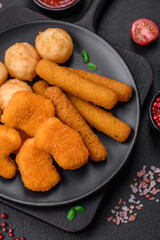 Delicious nuggets, sticks and balls of mozzarella and parmesan cheese with salt and spices